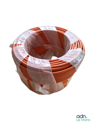 a coil of orange and white wire wrapped in plastic