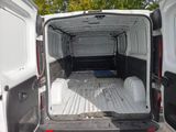 a white van that is parked in the parking lot