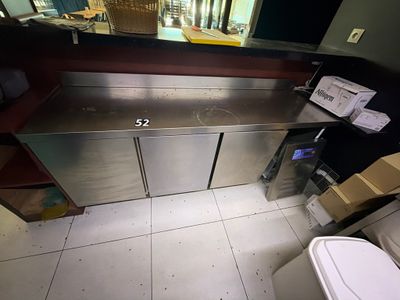 a stainless steel counter in a commercial kitchen