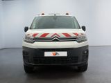 citroen van with red and white stripes parked in a white room