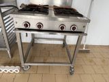 an image of a commercial gas range in a commercial kitchen