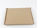 an open cardboard box on a white surface with a white background