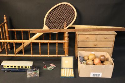 a wooden bed with a tennis racket on top of it