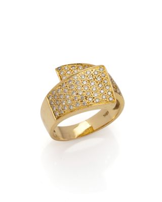 a yellow gold ring with white diamonds on a white background