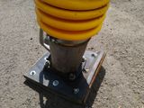 a close up of a pole with a bunch of bananas on top of it