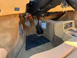 a view of the inside of a car from the driver ' s seat