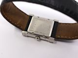 an image of a close up of a wrist watch on a white surface