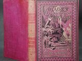 the front cover of a pink book with a picture of a man on a horse