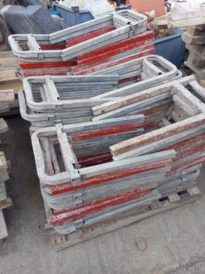many pieces of wood stacked on top of each other