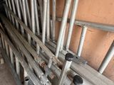 a bunch of pipes that are lined up in a room