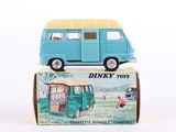 a toy van that is sitting on top of a box