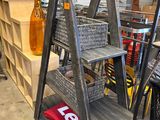 a wooden shelf with baskets on it in a room