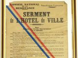 un vieux document orné d'une bande rouge et bleue