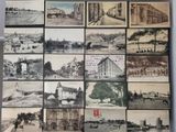 many pictures of a bunch of old buildings on the wall