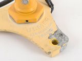 yellow and black safety device on white surface with white background
