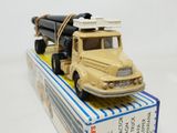 a toy truck that is sitting on top of a box