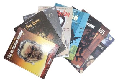un grand nombre de livres posés sur une table