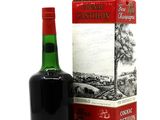 a bottle of wine that is next to a box