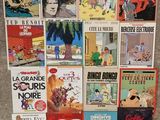 a lot of comic books on the floor on the floor
