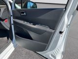 a door open of a car with the driver ' s side door open