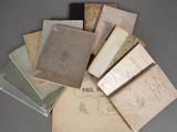 a pile of old books sitting on a table