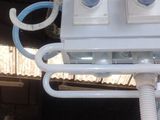 a picture of a white electrical box in a garage