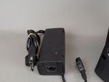 a charger and a power cord on a table