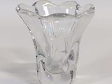 a clear glass vase that is sitting on a table