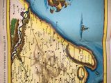an open book with a drawing of a map on it