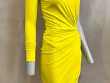 a yellow dress on a mannequin mannequin mannequin mannequin mannequin mann
