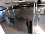 a stainless steel counter top in a commercial kitchen