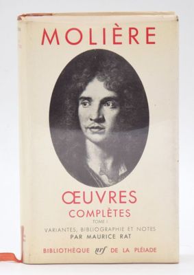 an old book with a picture of a woman in a black and white photo