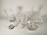 a lot of glass items sitting on a table