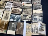 a lot of old postcards that are on the table