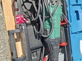 two tools in the case on the ground next to each other