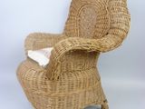 an image of a wicker chair on a white background