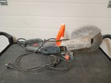 a machine that is sitting on a table in a garage