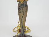 a vase that has a chain around it