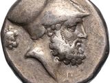 a close up of a coin with an image of a man on it
