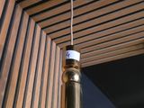 a light that is hanging from a ceiling in a room