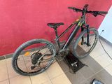 a bike that is sitting on a stand in a room