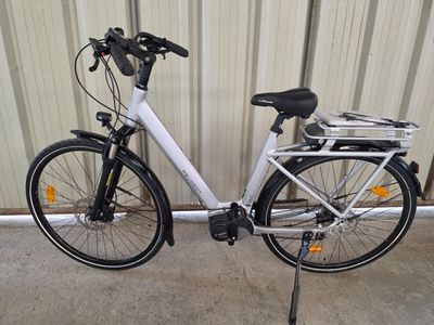 a bike that is parked in front of a building