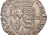 an old silver coin with a crown on top of it