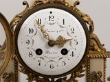 a clock that is sitting on top of a table