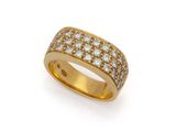 a gold and diamond band ring