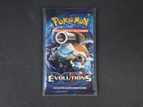 La carte à collectionner Pokémon est posée sur une surface noire
