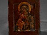 painting of a woman holding a cat in a wooden frame