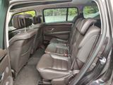 the interior of a car with the back seats folded down