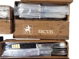 three boxes of various types of kitchen utensils in them