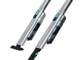 a pair of two electric hair dryers sitting on top of each other